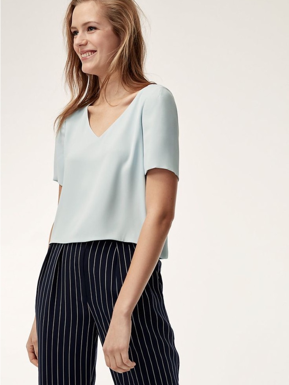 Babaton V-Neck Cropped Blouse in Light Blue Size XS